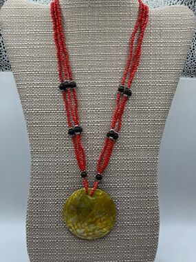 Red Beaded Necklace with Yellow Shell Pendant